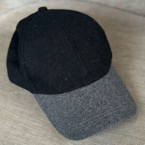 Black and gray felted no logo baseball hat with adjustable fit